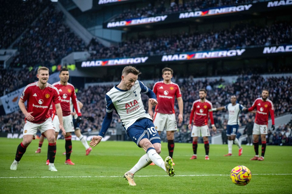 James Maddison of Tottenham Hotspur FC kicking a soccer ball during a match.