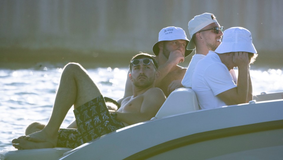 Men on a speedboat.