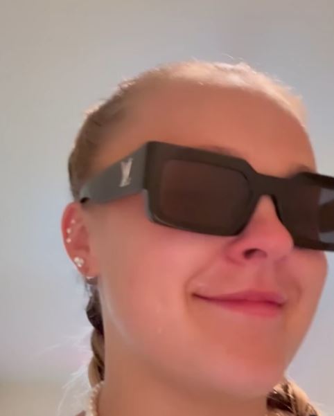 JoJo Siwa wearing sunglasses.