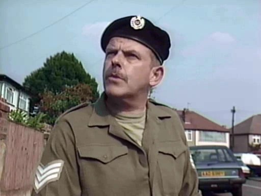 Julian Holloway in a military uniform.
