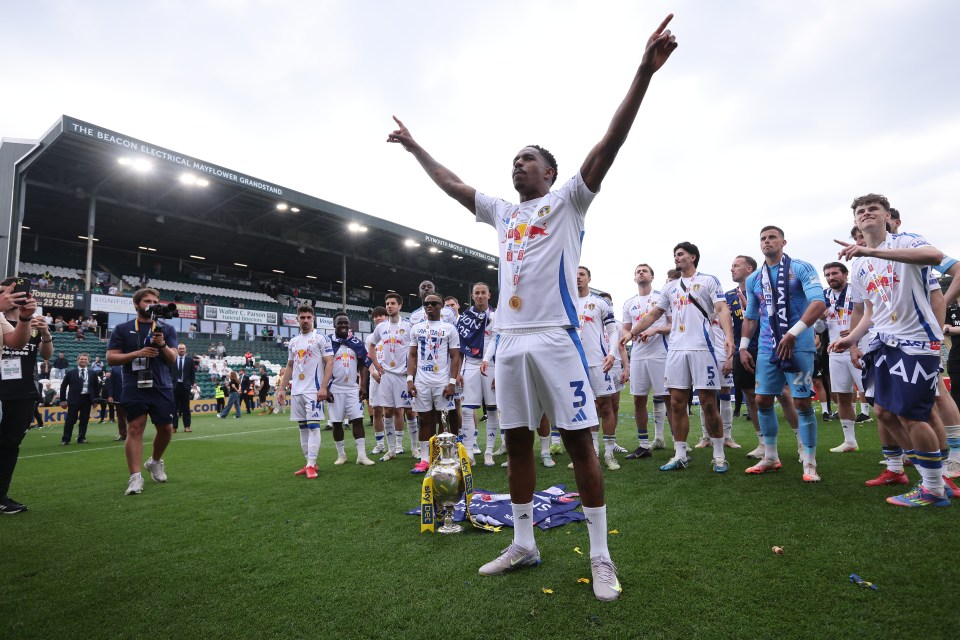 Junior Firpo of Leeds United celebrates winning The Championship title.