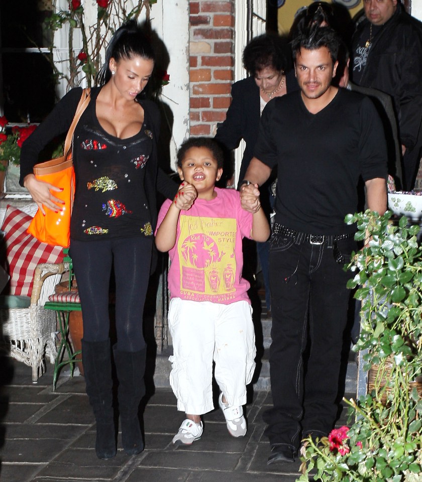 Katie Price, Peter Andre, and their son Harvey leaving a restaurant.
