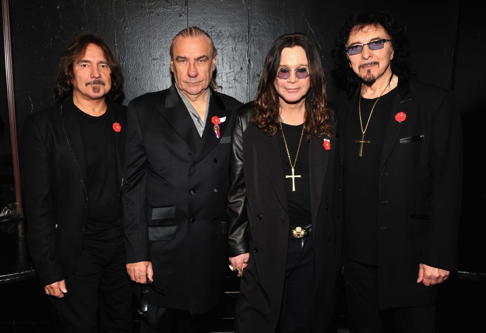 Black Sabbath band members at a press conference.