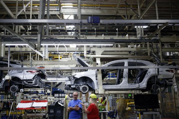 An image collage containing 1 images, Image 1 shows Toyota Camry assembly line at a Georgetown, Kentucky plant