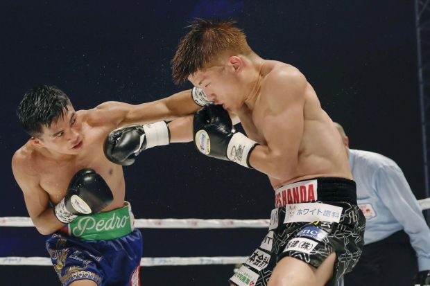 An image collage containing 1 images, Image 1 shows Two boxers in a boxing match