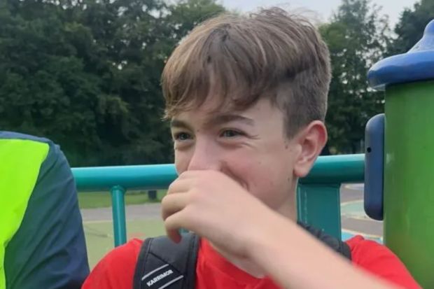 An image collage containing 1 images, Image 1 shows Teenage boy laughing, wearing a red shirt and backpack