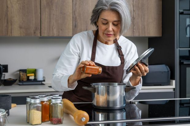 An image collage containing 1 images, Image 1 shows A mature woman seasoning food in a modern kitchen