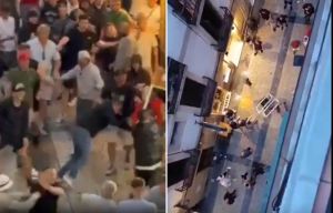 Shocking moment Man Utd & Spurs fans brawl in Spain ahead of Europa final