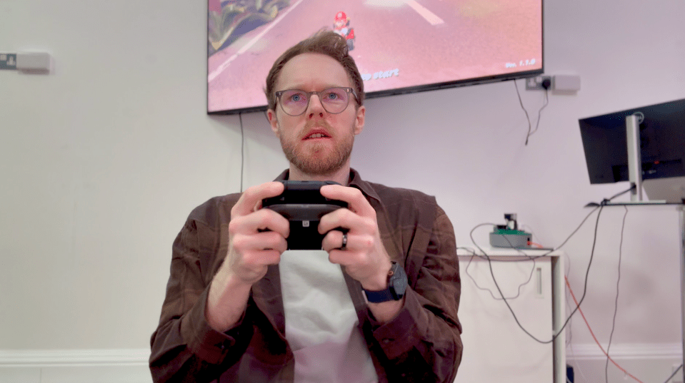 Man playing Nintendo Switch.