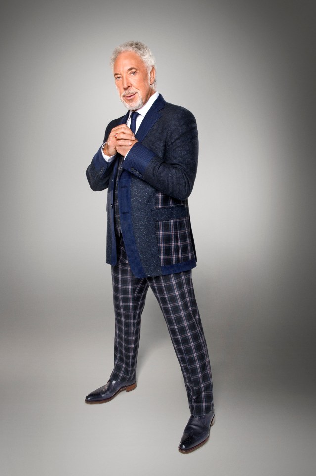 Sir Tom Jones in a plaid suit.