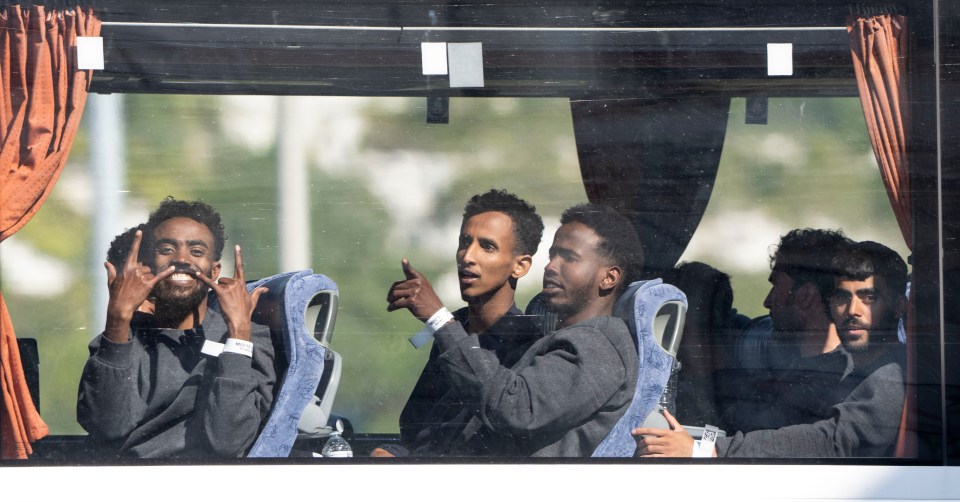Migrants on a bus in Dover, UK.