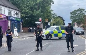 Two men shot at near primary school with road closed and cops swarmed to scene