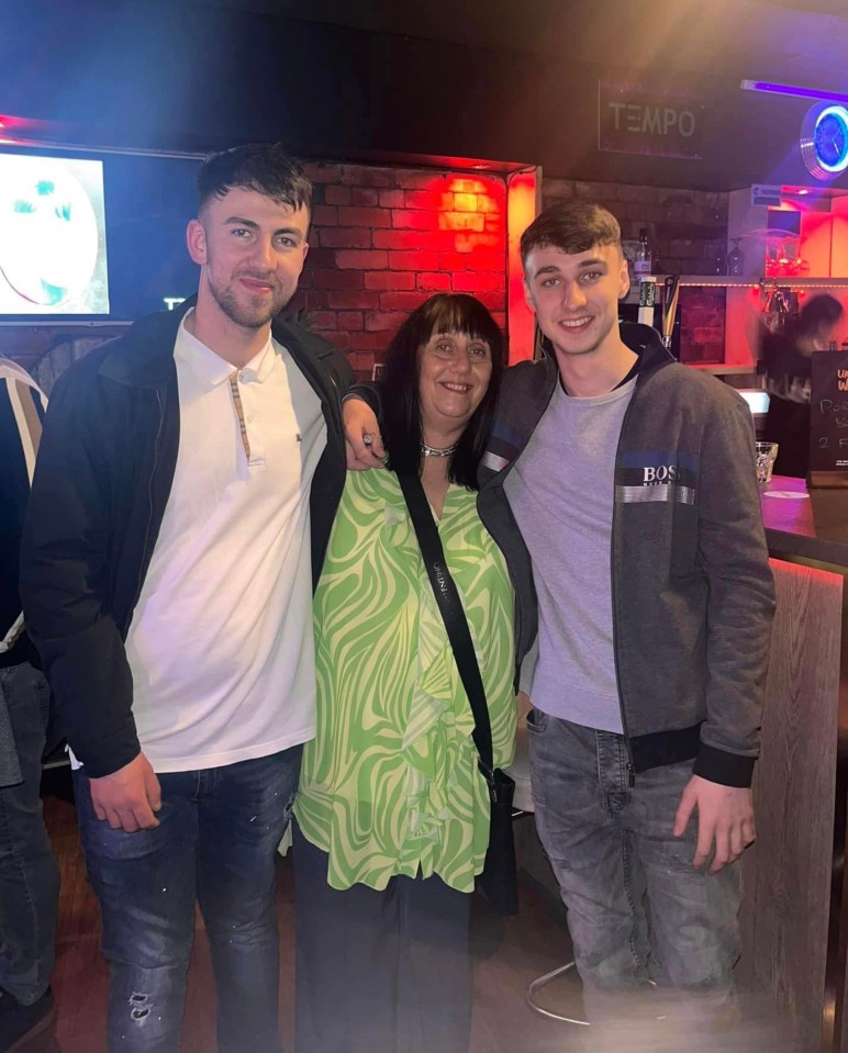 Photo of Jay Slater with his mother and brother.