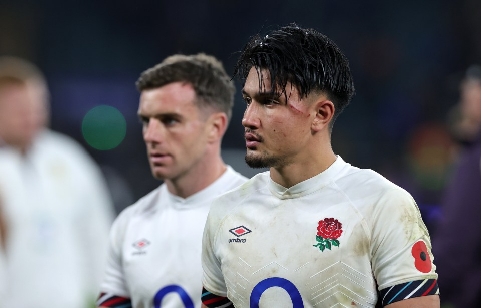 Marcus Smith and George Ford of the England rugby team looking dejected after a match.