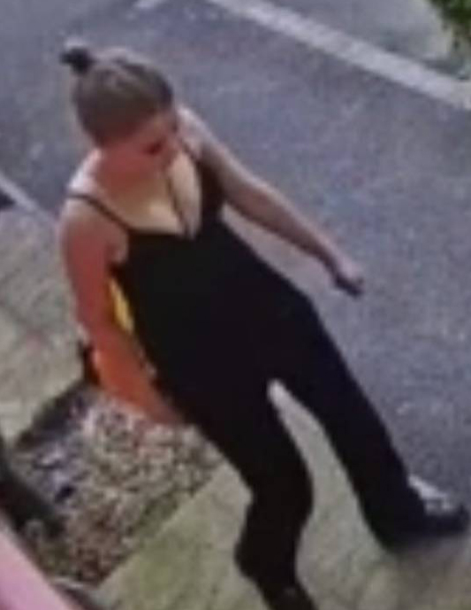 Surveillance image of missing 13-year-old girl wearing black vest and tracksuit bottoms.