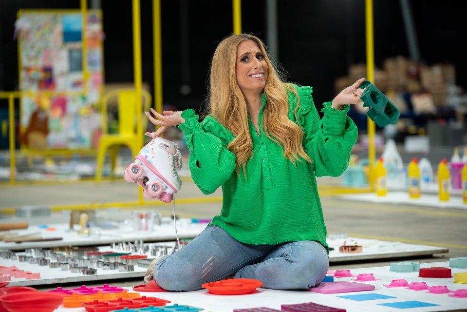 Stacey Solomon from Sort Your Life Out holding roller skates and a container.