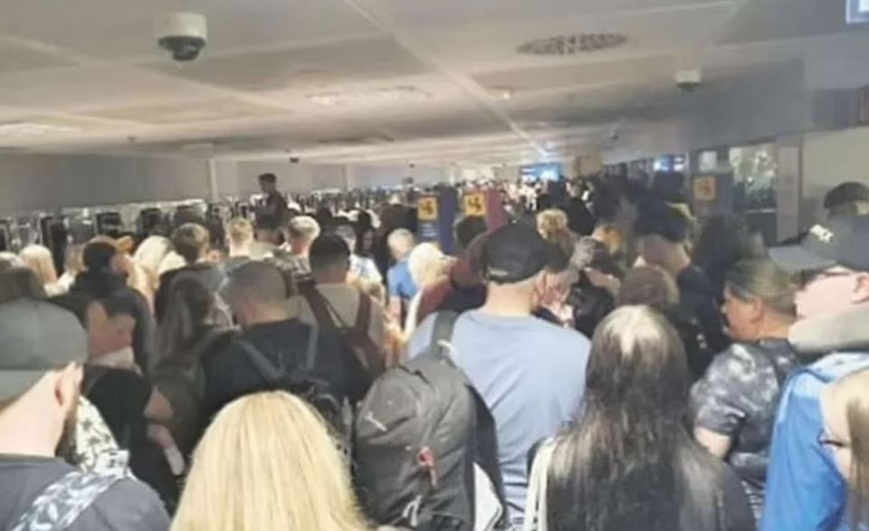 Overcrowded airport passport control.