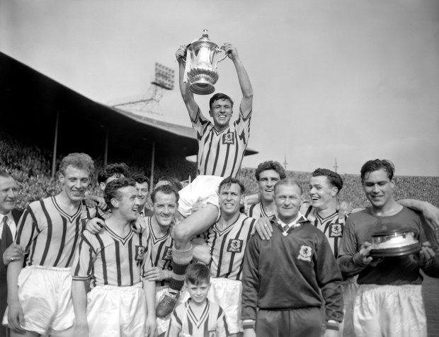 Aston Villa players celebrating their FA Cup victory.