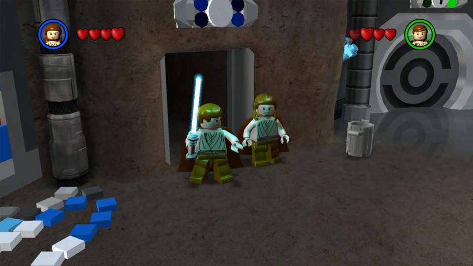 Lego Star Wars game screenshot showing Obi-Wan Kenobi and Anakin Skywalker minifigures.