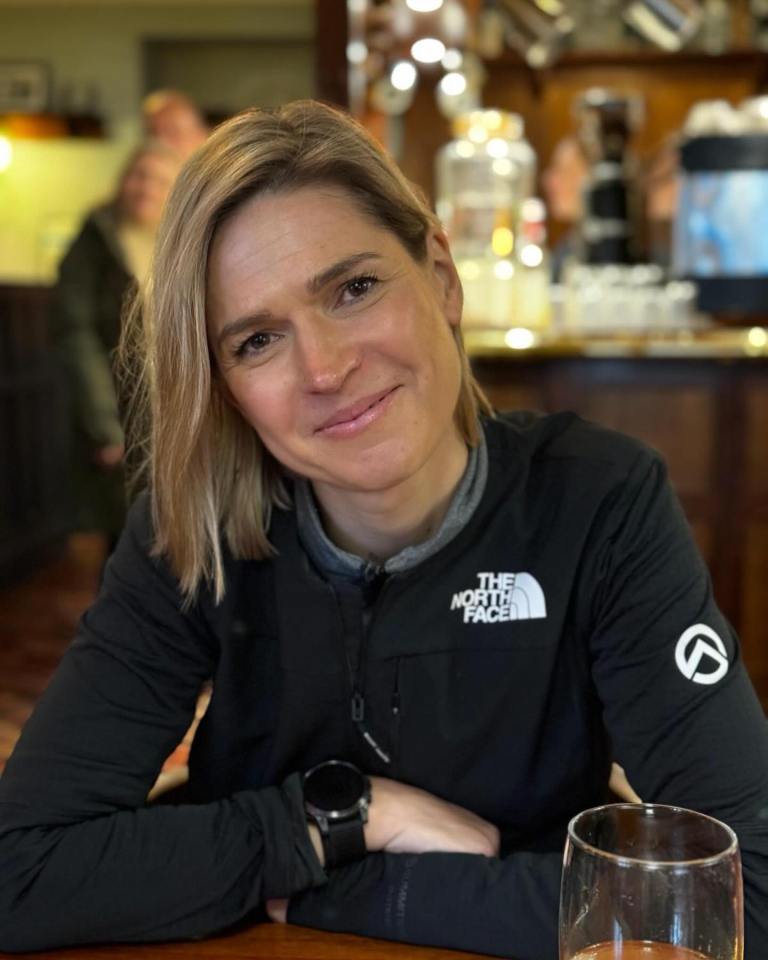Woman wearing a North Face jacket.