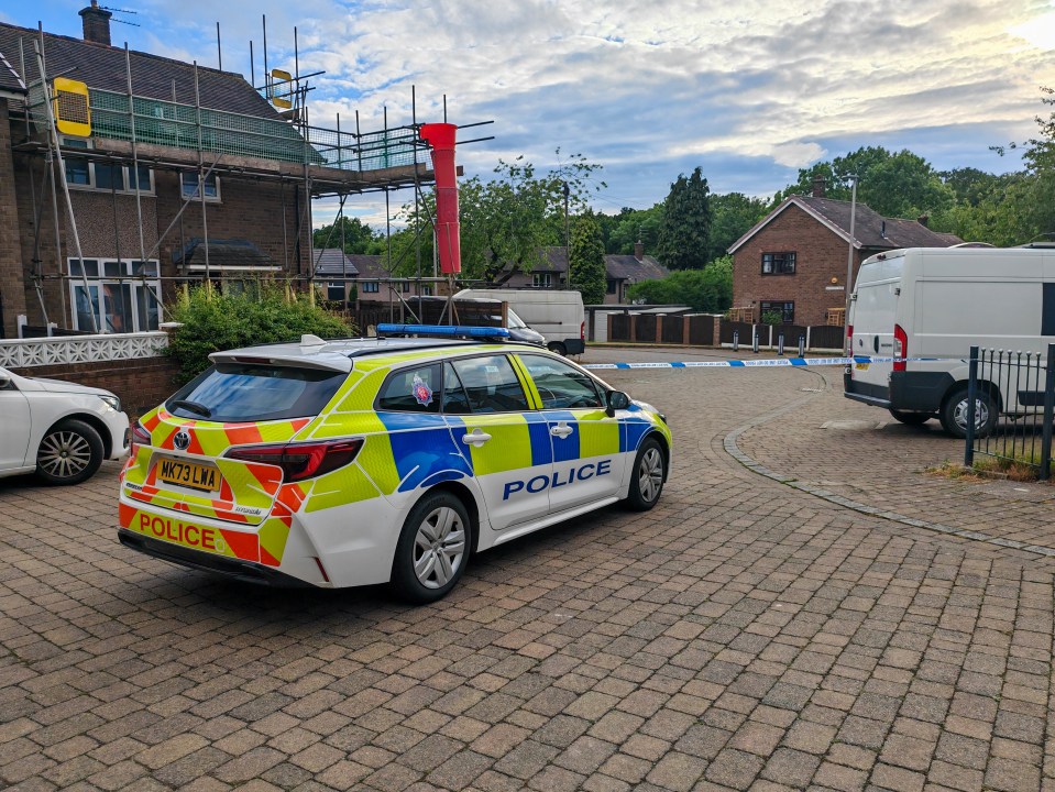 Police car at a crime scene.