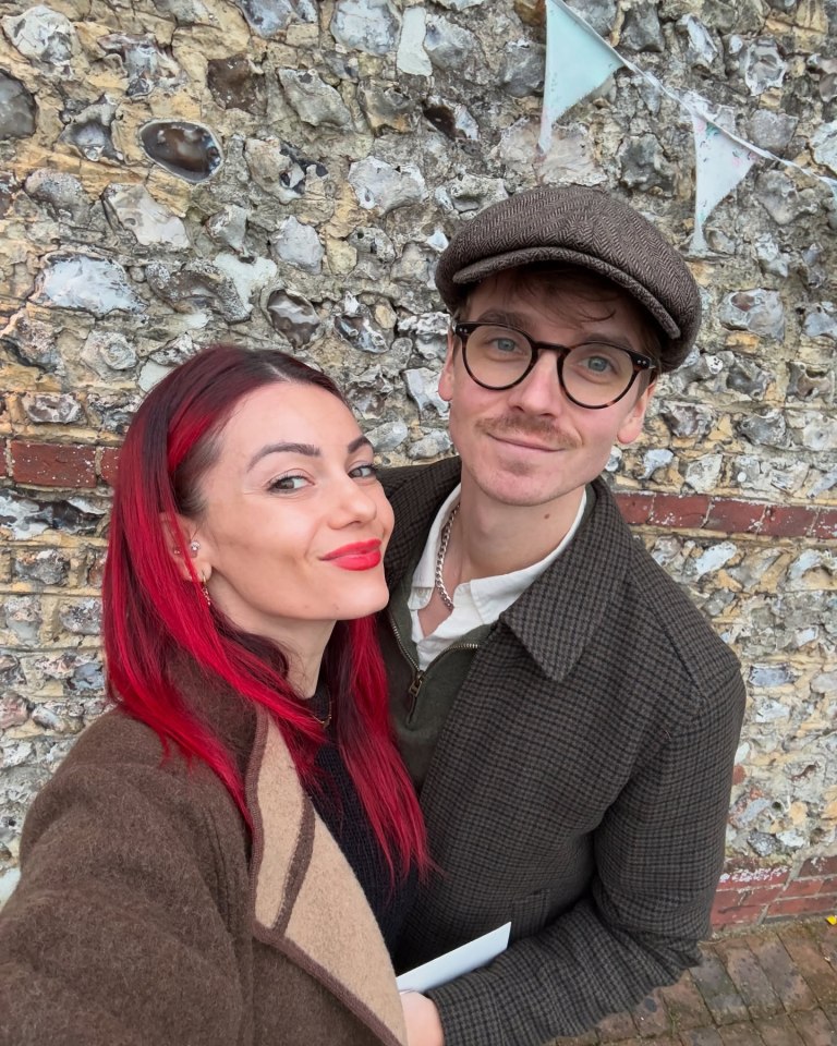 Dianne Buswell and Joe Sugg posing together.