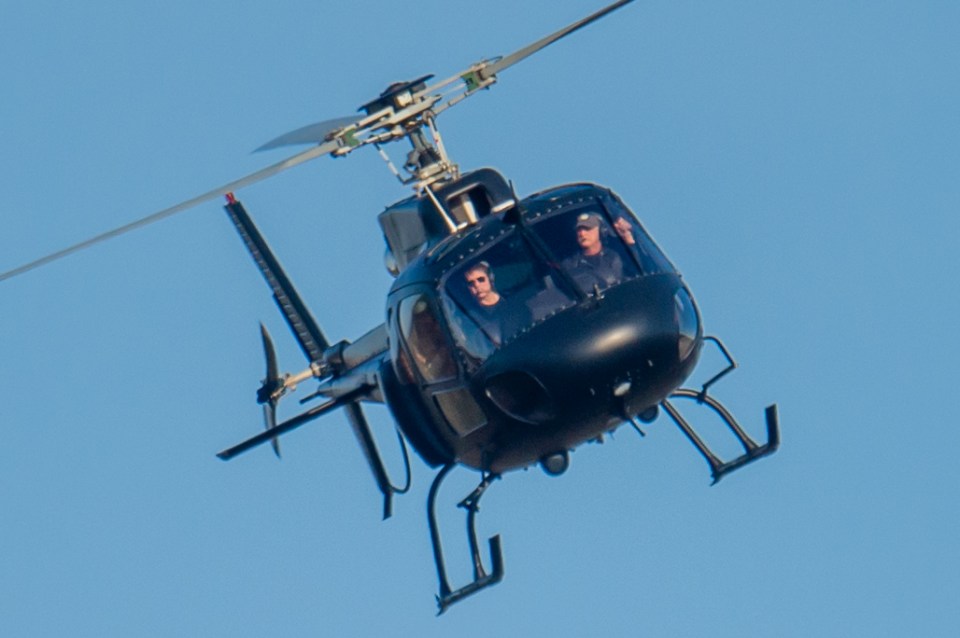 Tom Cruise and Christopher McQuarrie in a helicopter.