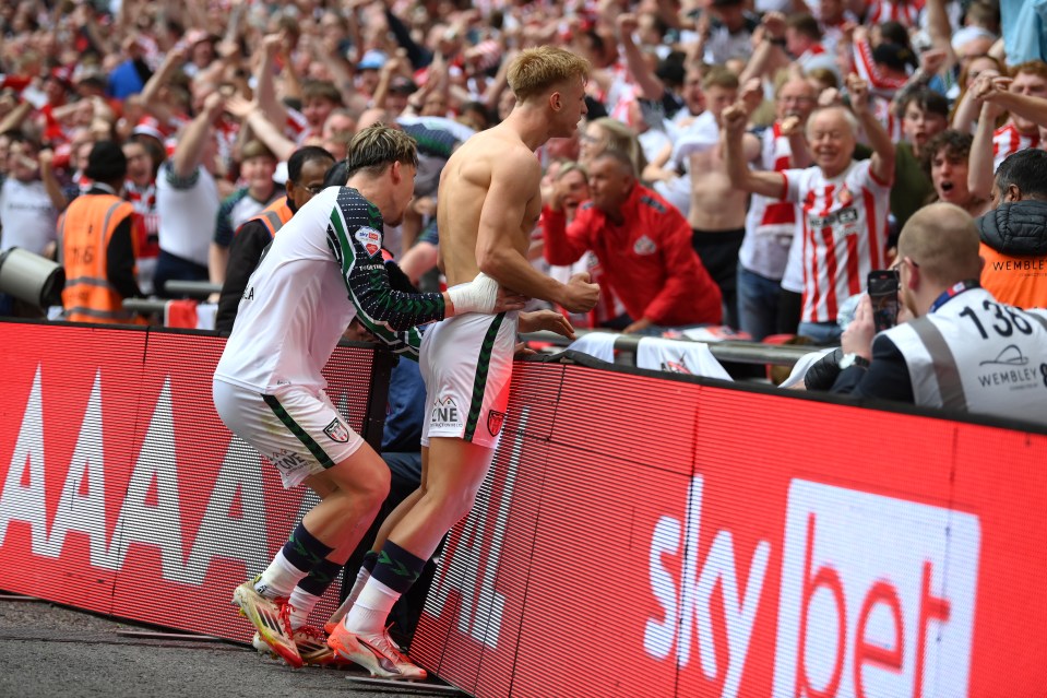 Tom Watson of Sunderland celebrates scoring a goal at Wembley Stadium.