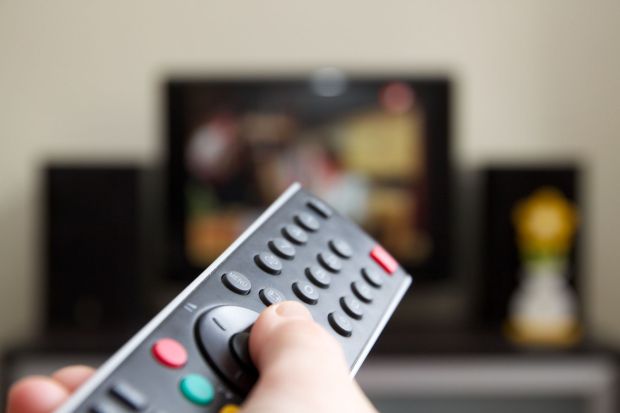 An image collage containing 1 images, Image 1 shows Hand holding a TV remote