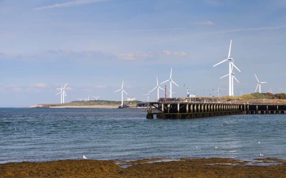 Wind turbines across the River Derwent.