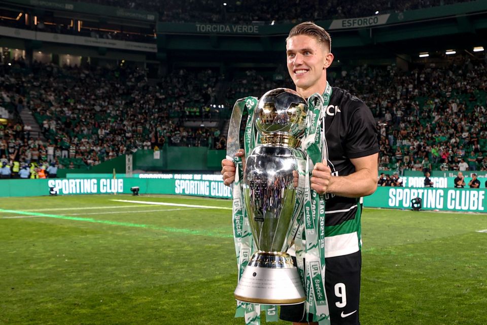 Viktor Gyokeres of Sporting CP holding a trophy after a match.