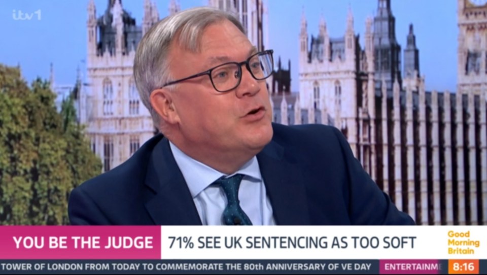 Screenshot of a man in a suit speaking on a television program about UK sentencing.