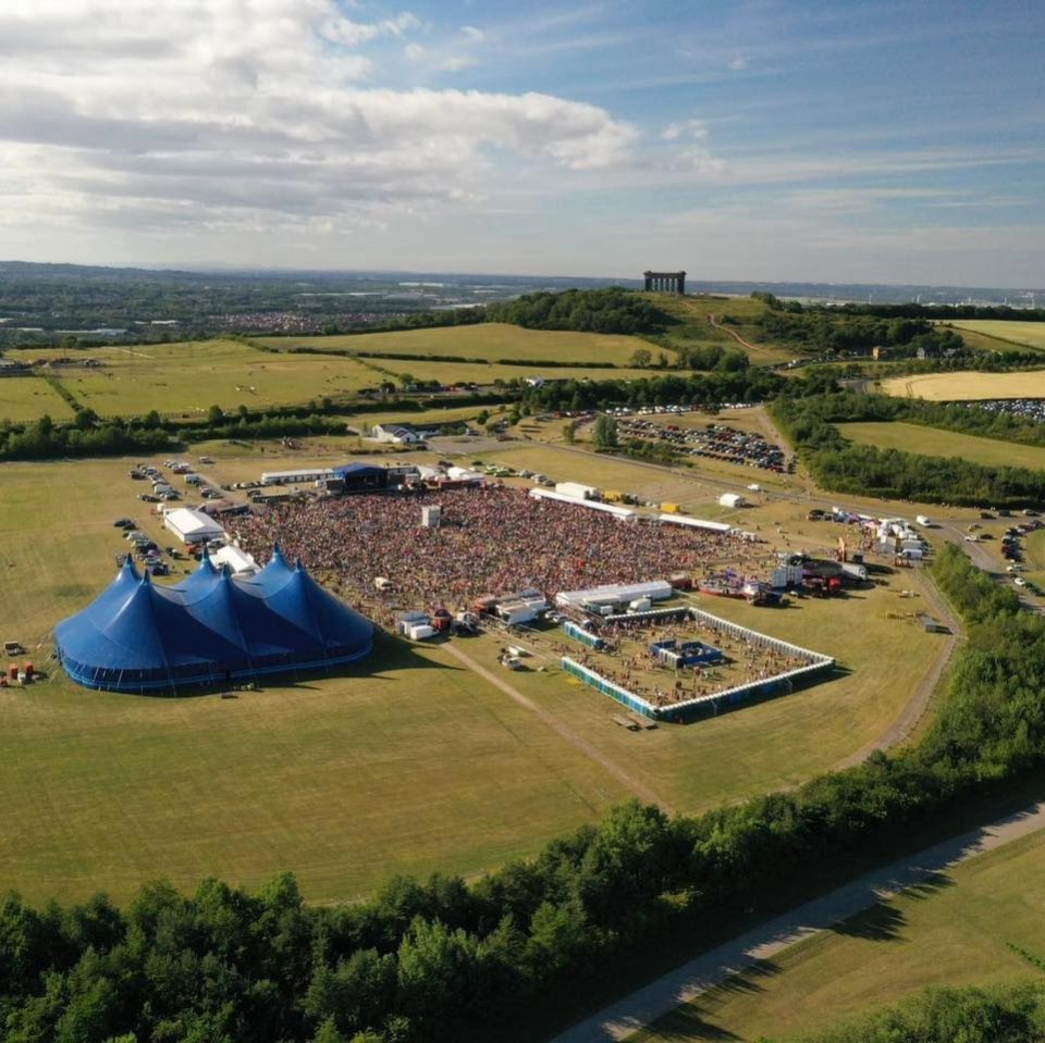 Aerial view of a music festival.