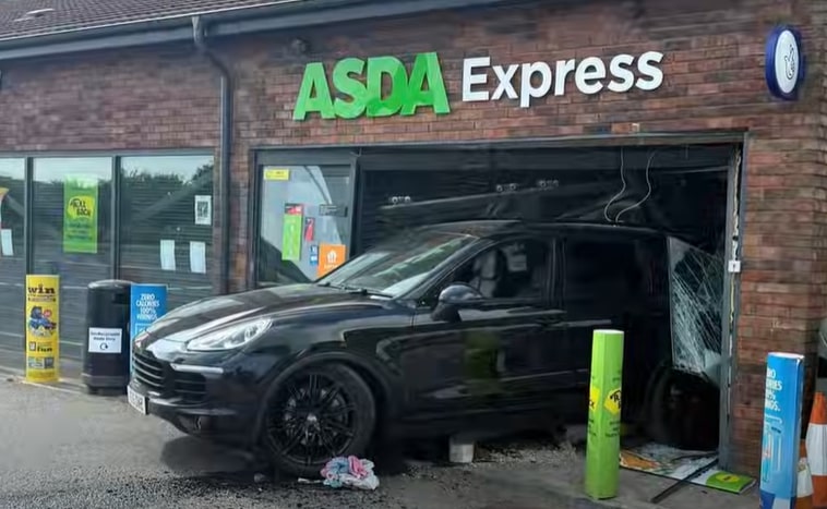 A black Porsche crashed into an ASDA Express store.