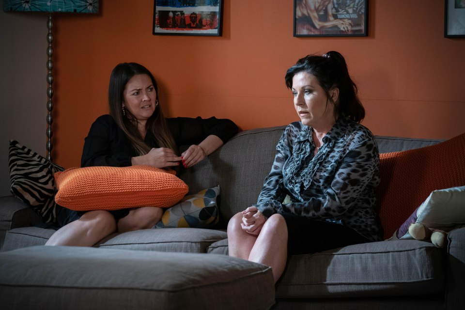 Stacey Fowler and Kat Moon sitting on a couch, talking.