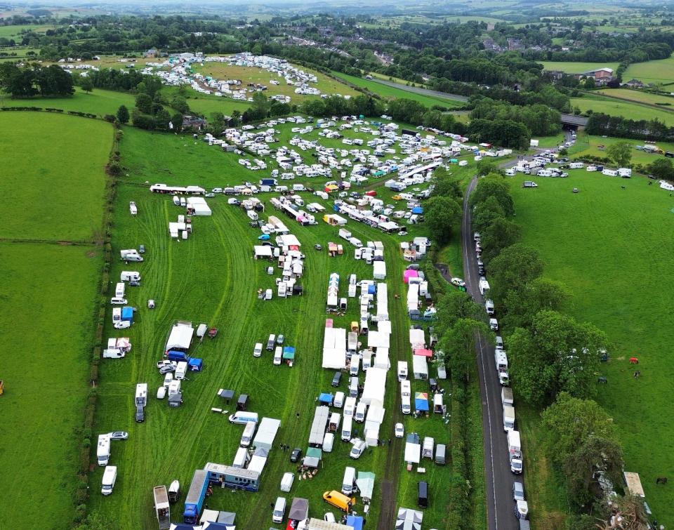 Aerial view of travellers queuing for a campsite.