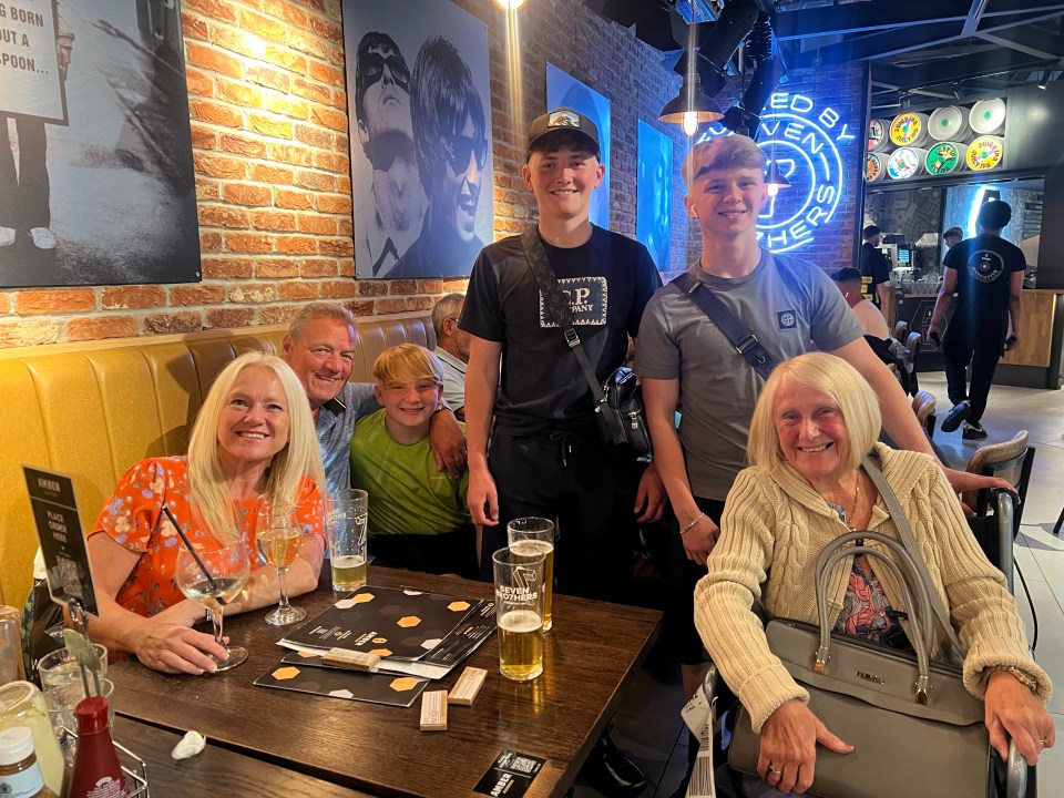 Family at a restaurant table.