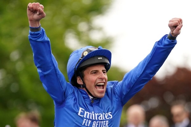Jockey William Buick celebrating a win at the Betfred 1000 Guineas Stakes.