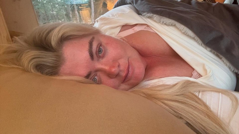 Gemma Collins lying in bed, appearing unwell.