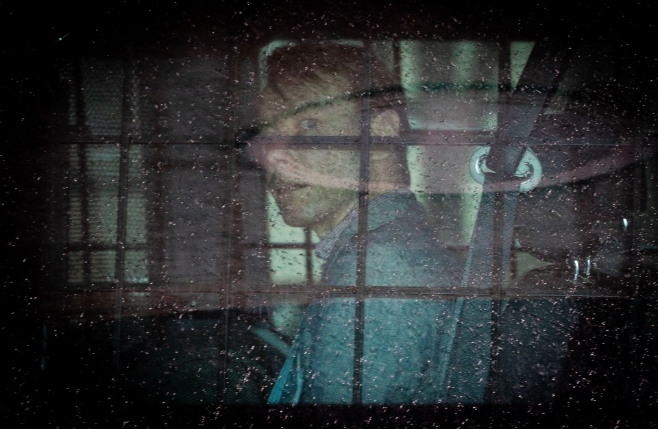 Blurry photo of Christian Brueckner in a prison van.