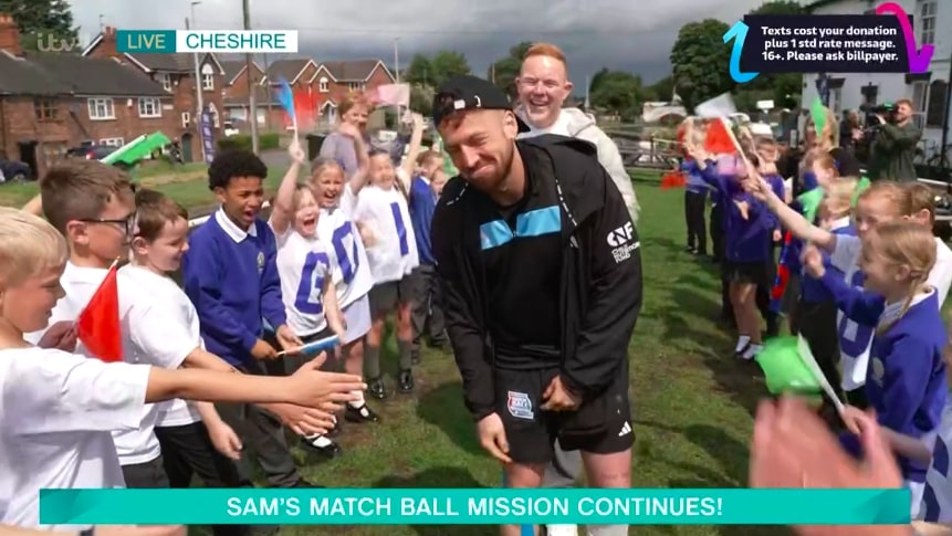 Sam Thompson surprised by children during endurance challenge.