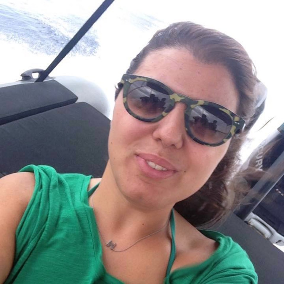 Marissa Laimos wearing camouflage sunglasses and a green shirt.